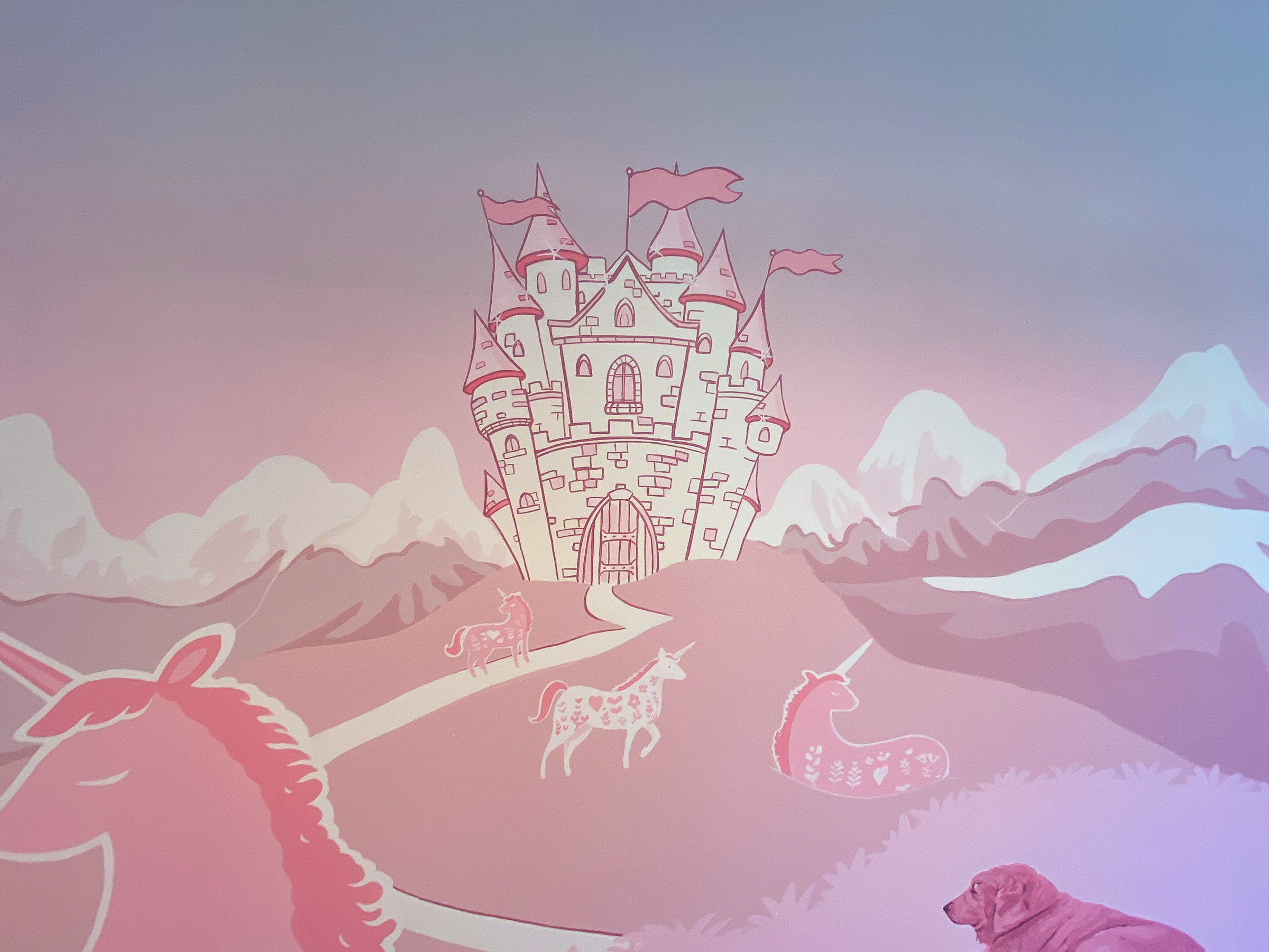 Lovely feeling white and pink castle feature of the girl's bedroom mural