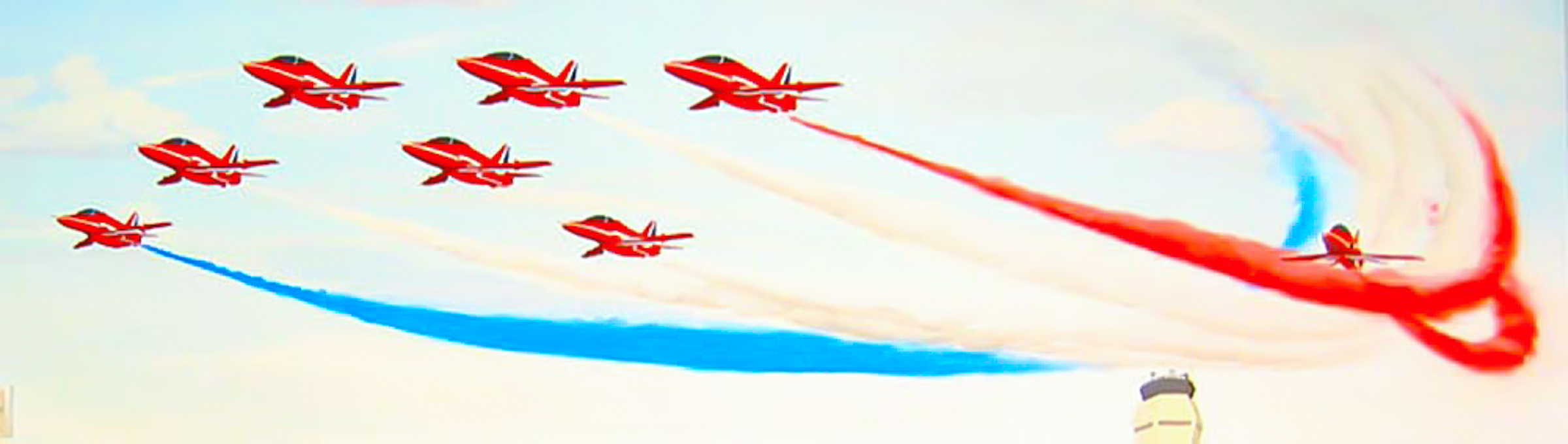Formation flying by the Royal Air Force RAF Aerobatic Team