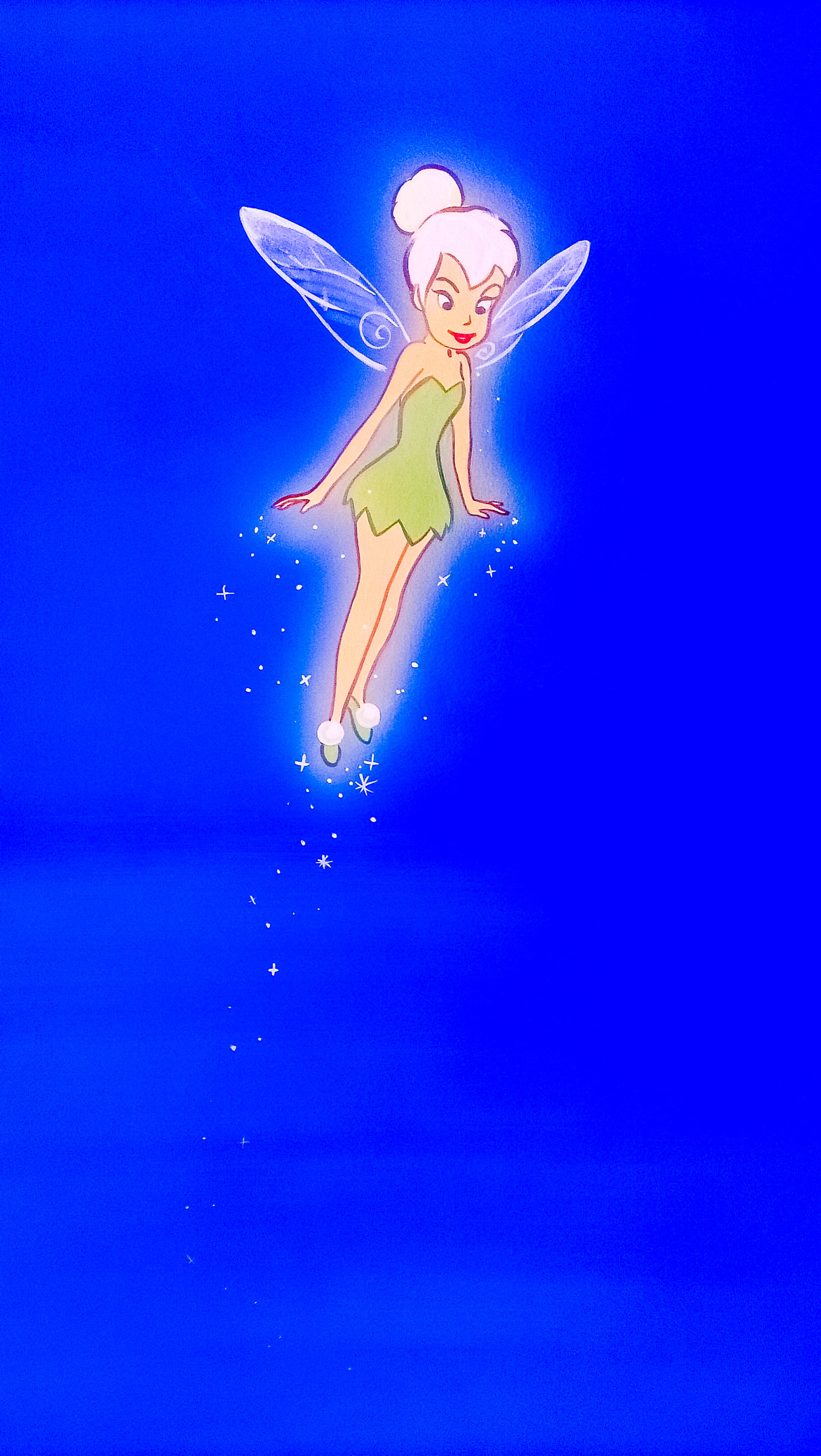 Tinkerbell glowing in this corner of the Disney nursery mural