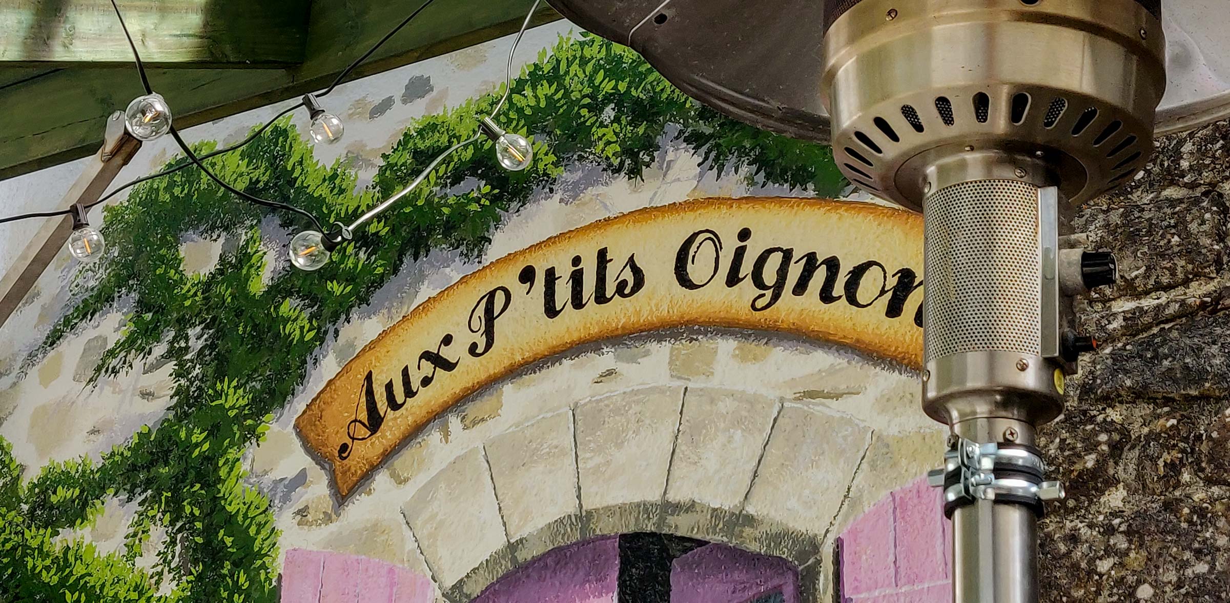 Hand-painted sign from a jaunty angle