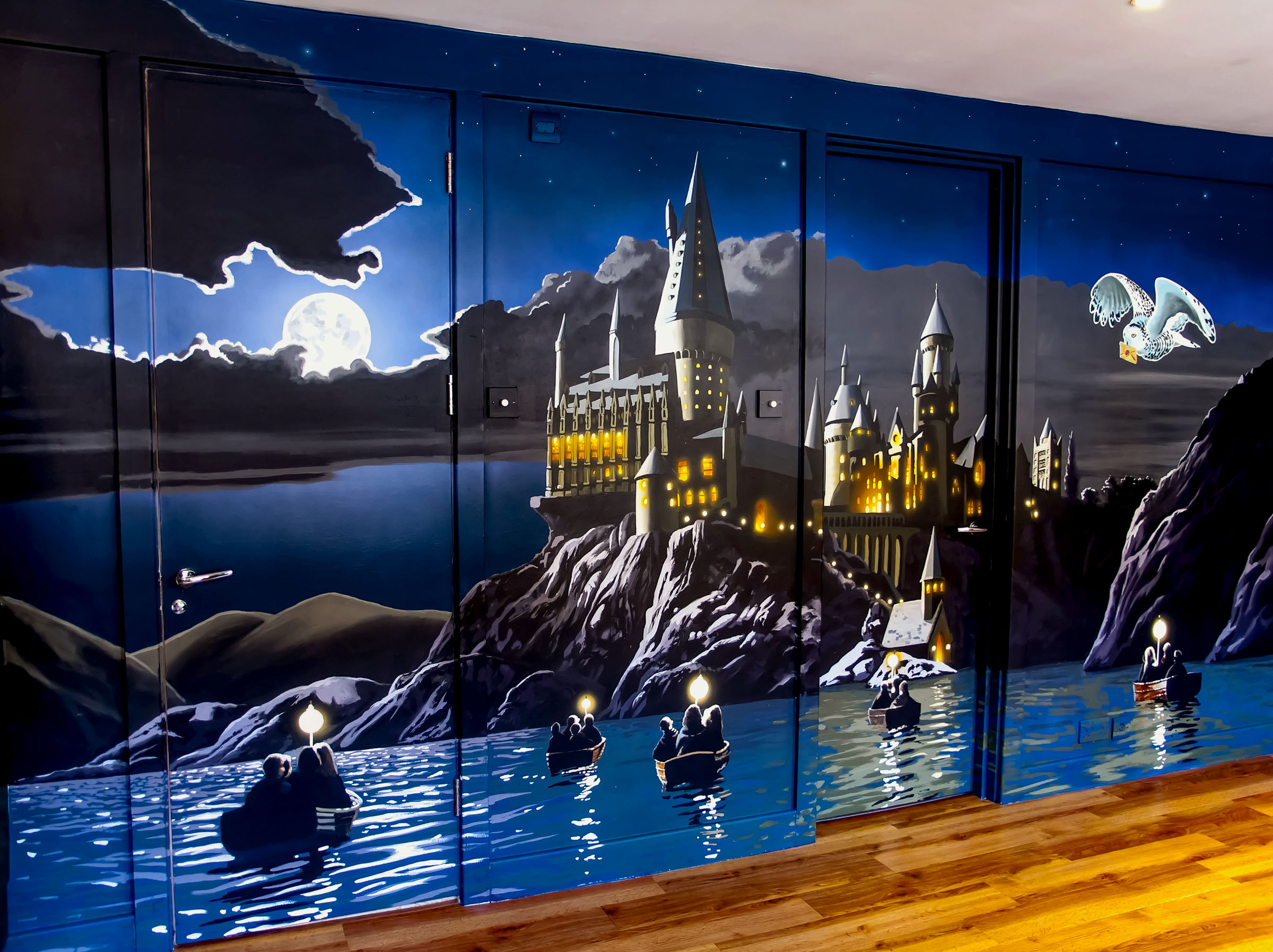 Kid's murals, Harry Potter Wall Mural - Hogwarts from the lake at night with the first year initiate wizards and witches.