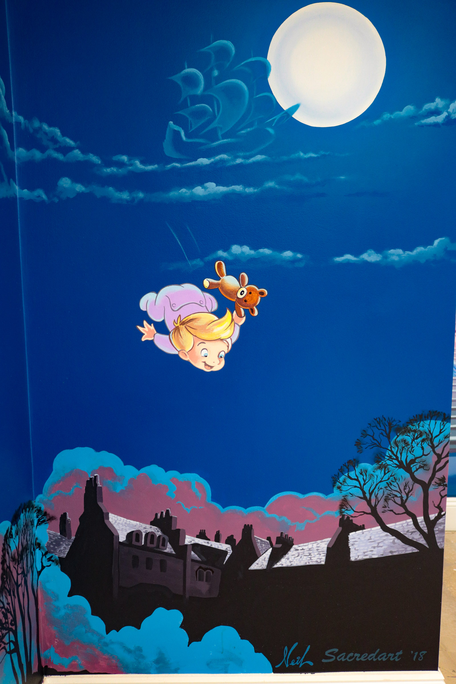 mega disney mural in playroom