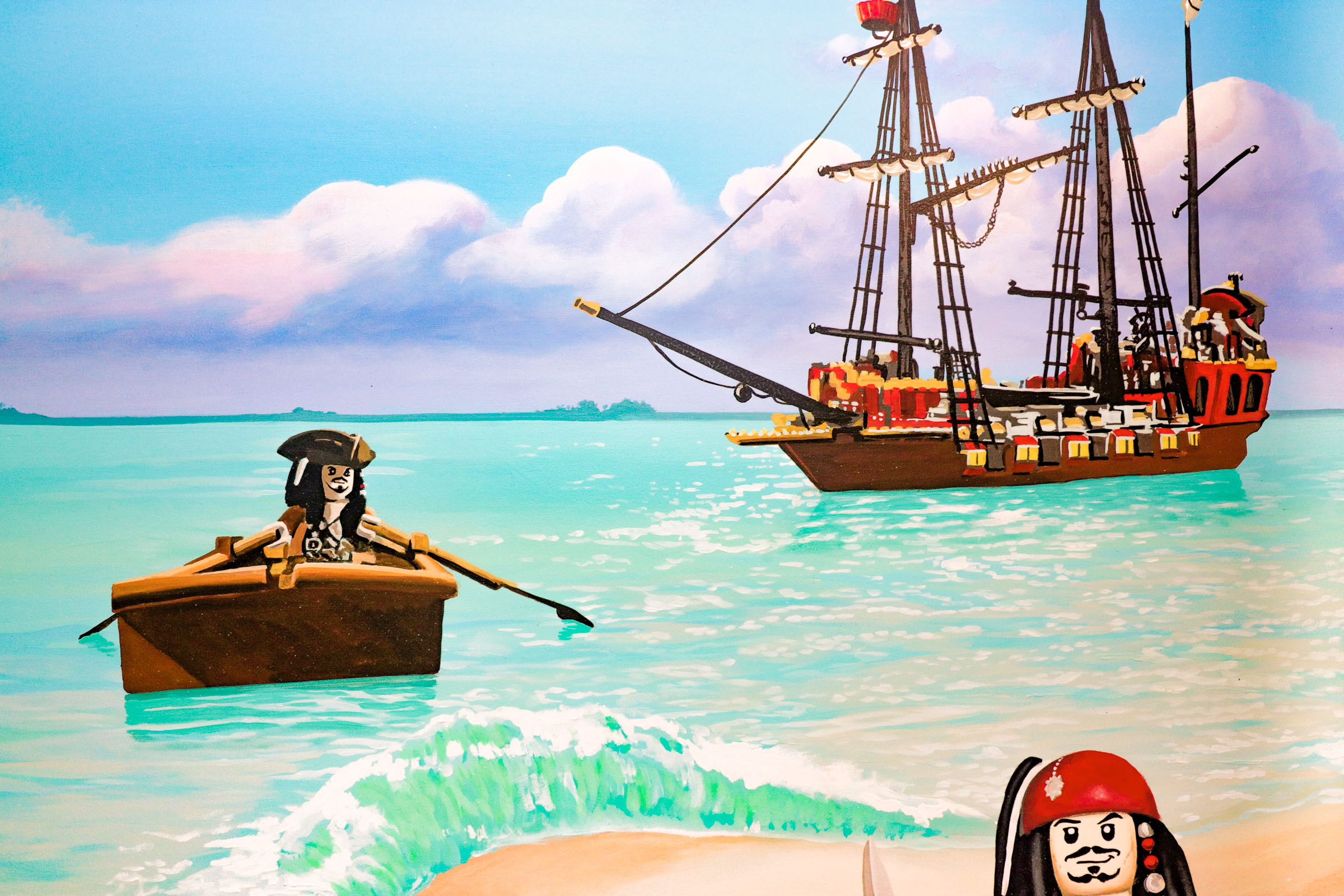 Lego Jack Sparrow rowing from the beach to his Lego pirate ship