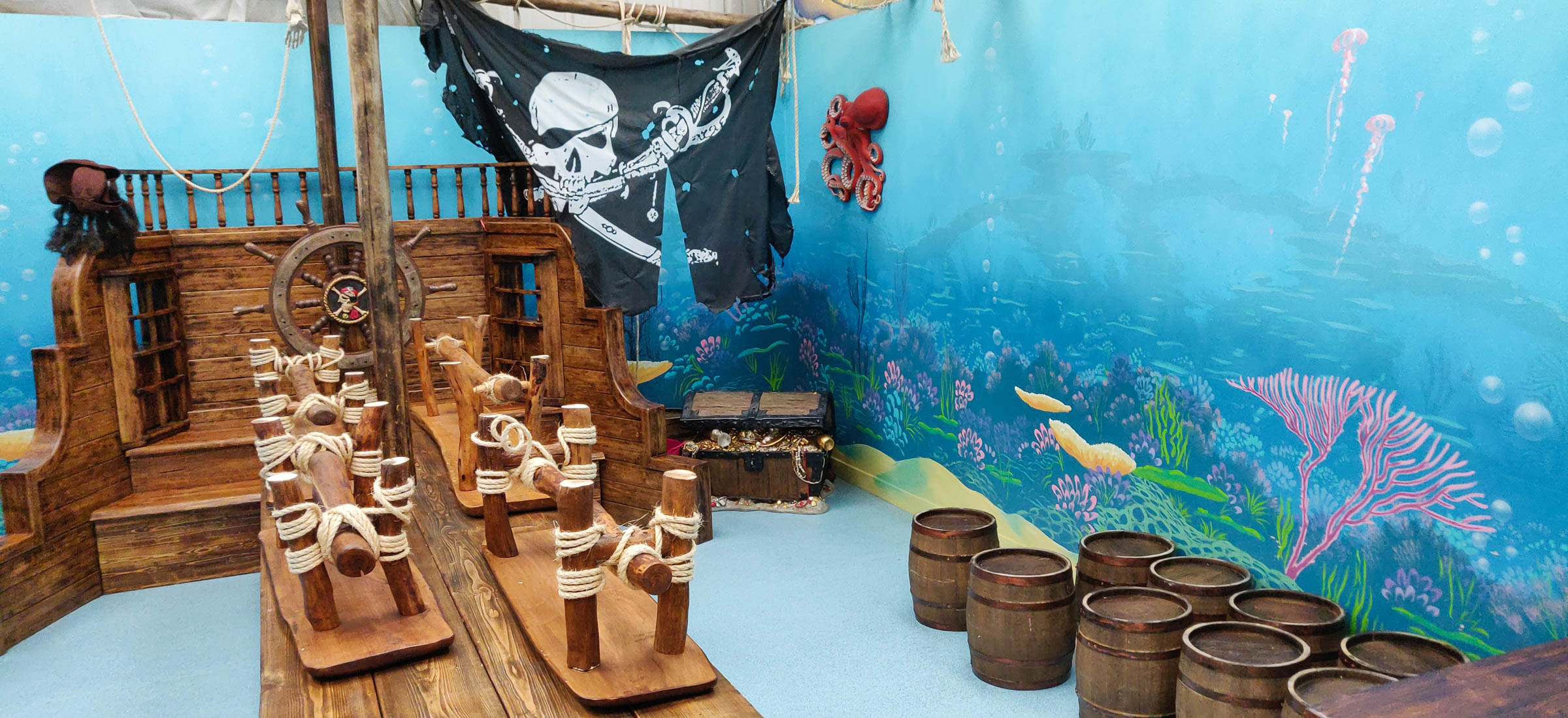 Pirate flag and treasure chest finish off the muralled space brilliantly