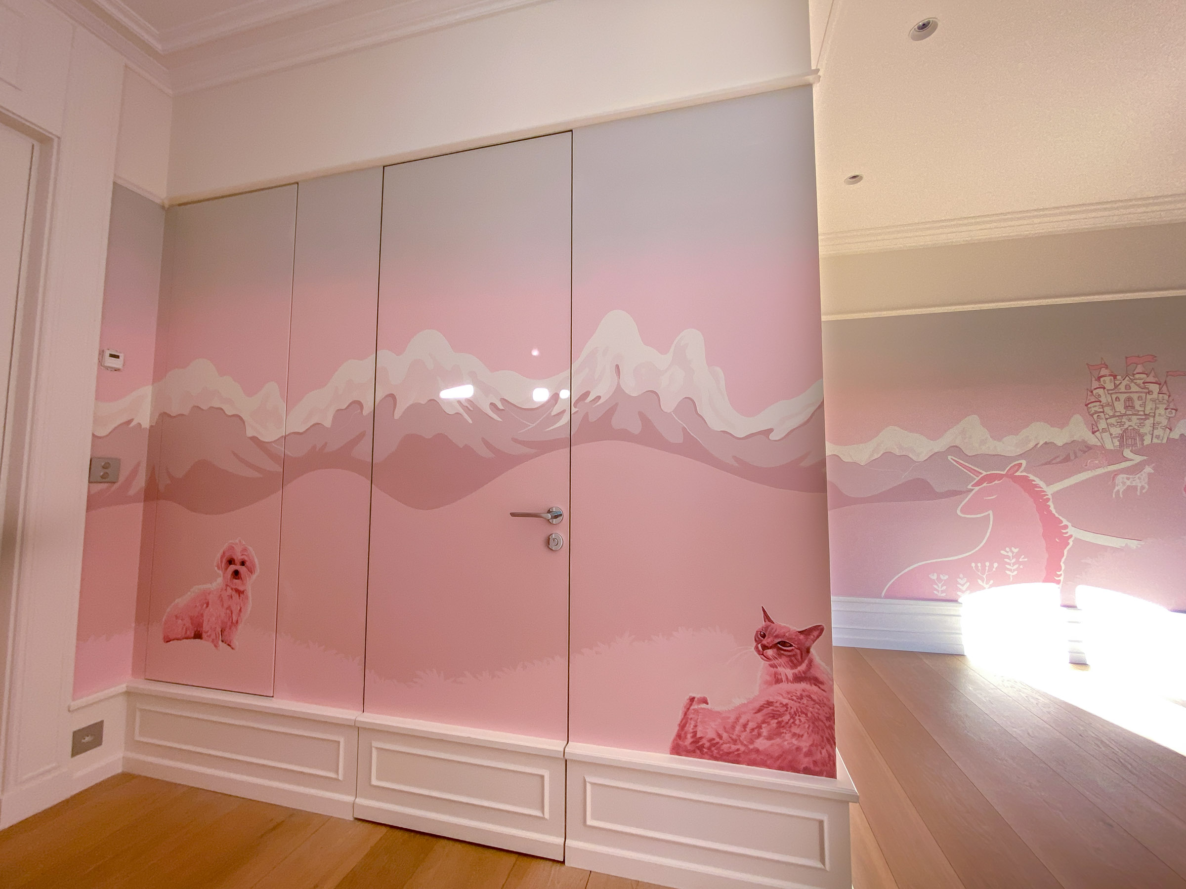 Bedroom mural for client's daughter, showing layered mountain scene and two more of their pets. Door hides the en-suite bathroom