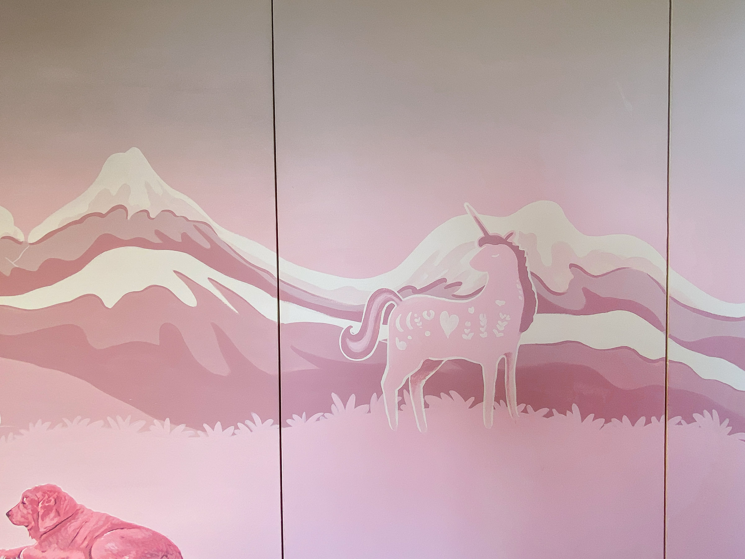 Gentle subtle unicorn on this section of the mural