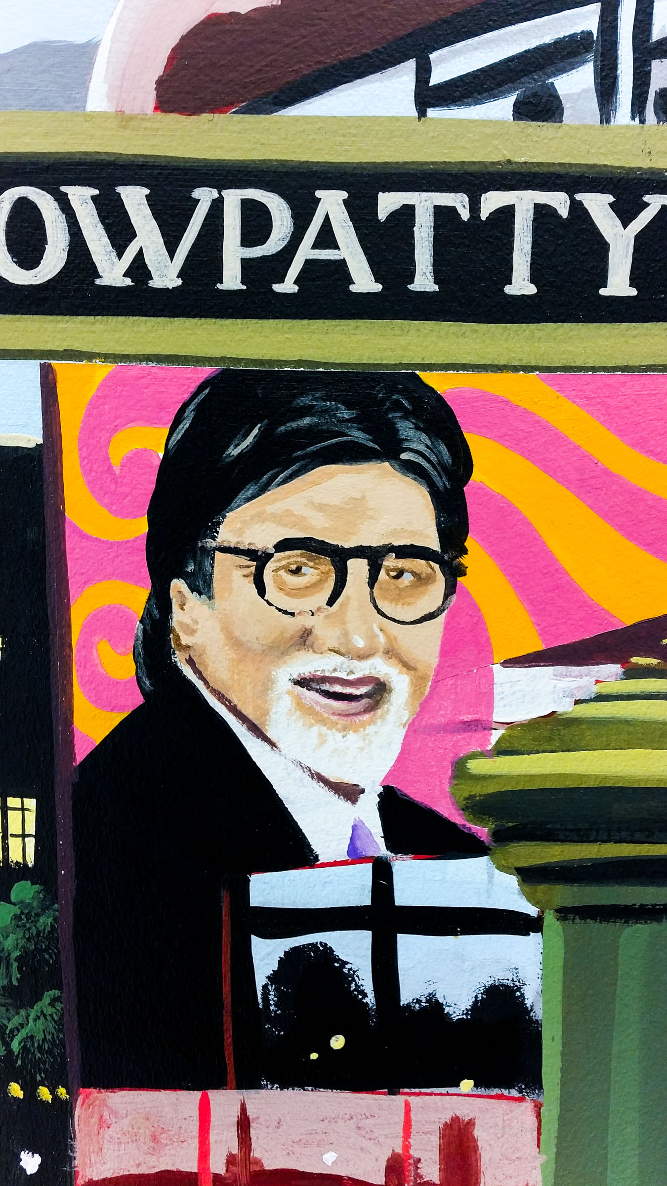 Mural of Bollywood superstar Amitabh Bachchan on the side of an English Routemaster bus