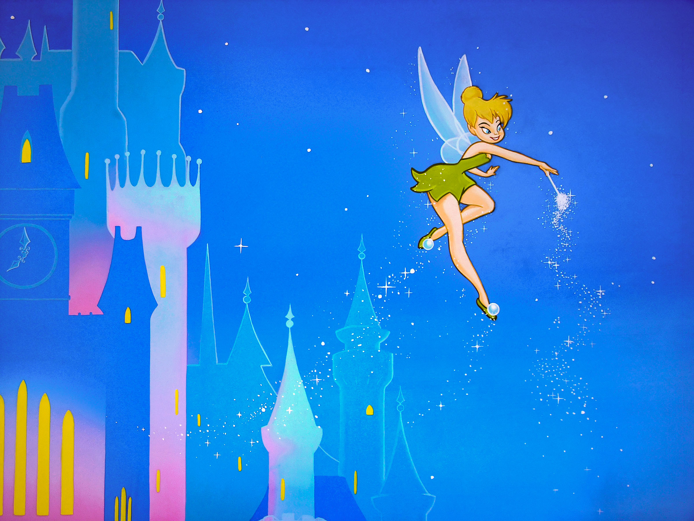 Peter Pan bedroom murals mural with Tinkerbell sprinkling fairy dust in front of turquoise blue disney style castle