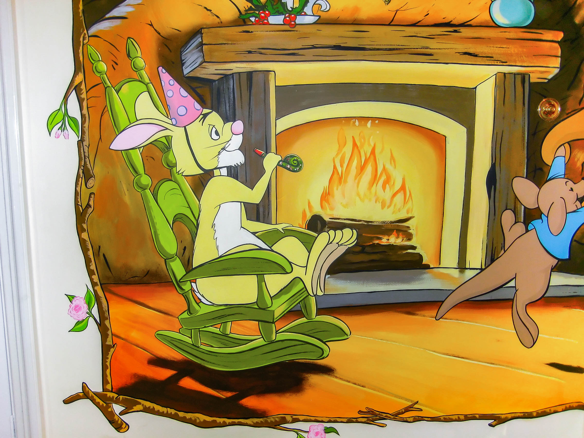 rabbit-in-party-hat-rocking-chair-log-fire-twig-frame-mural
