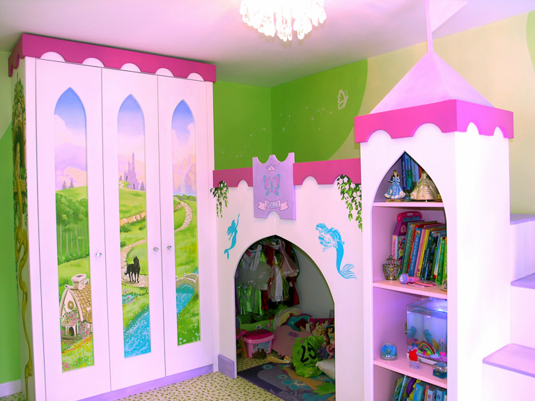 Princess castle mural on fitted wardrobe with bed and a kingdom through arched windows