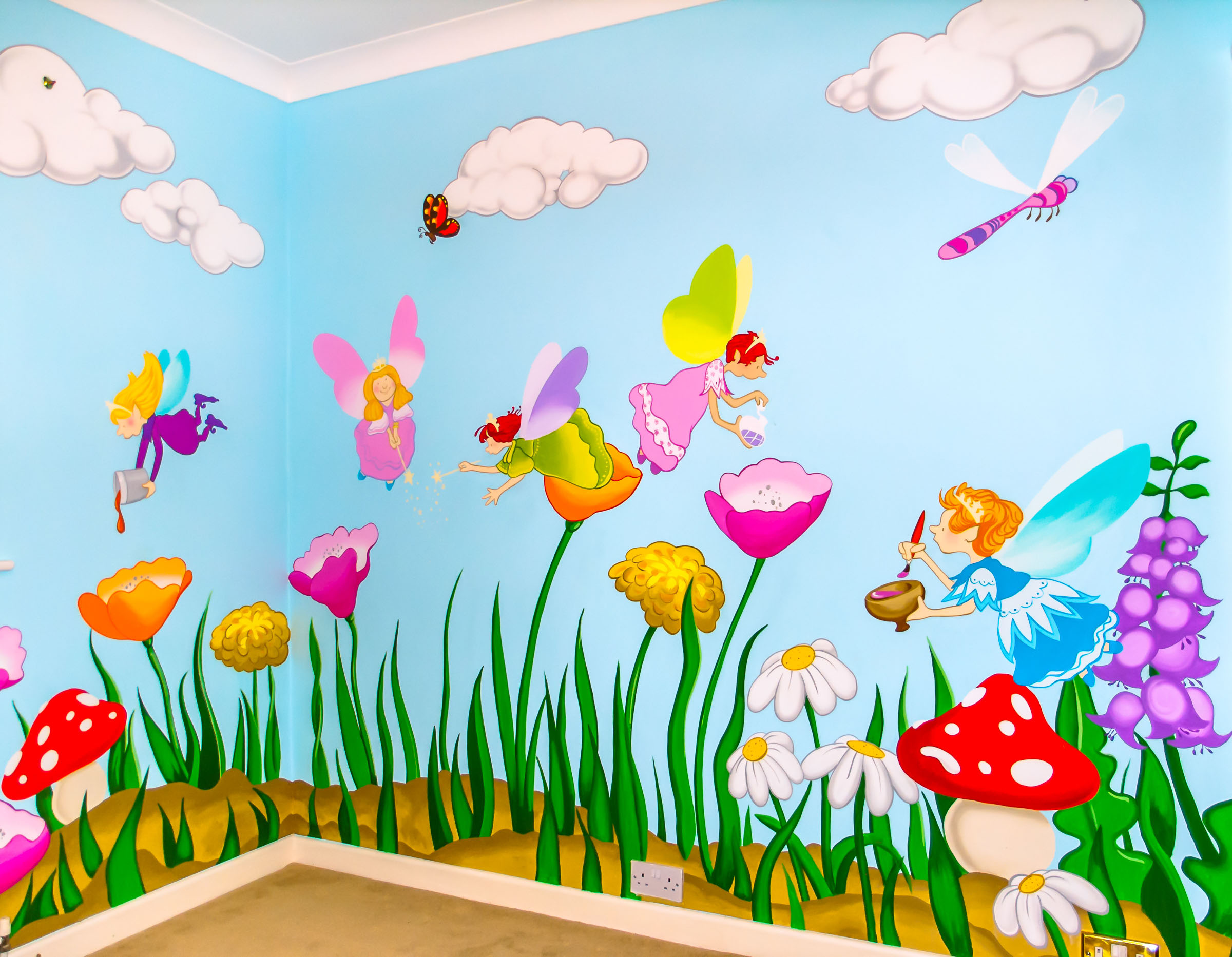 Cute colourful fairies wall mural, with flowers and mushrooms