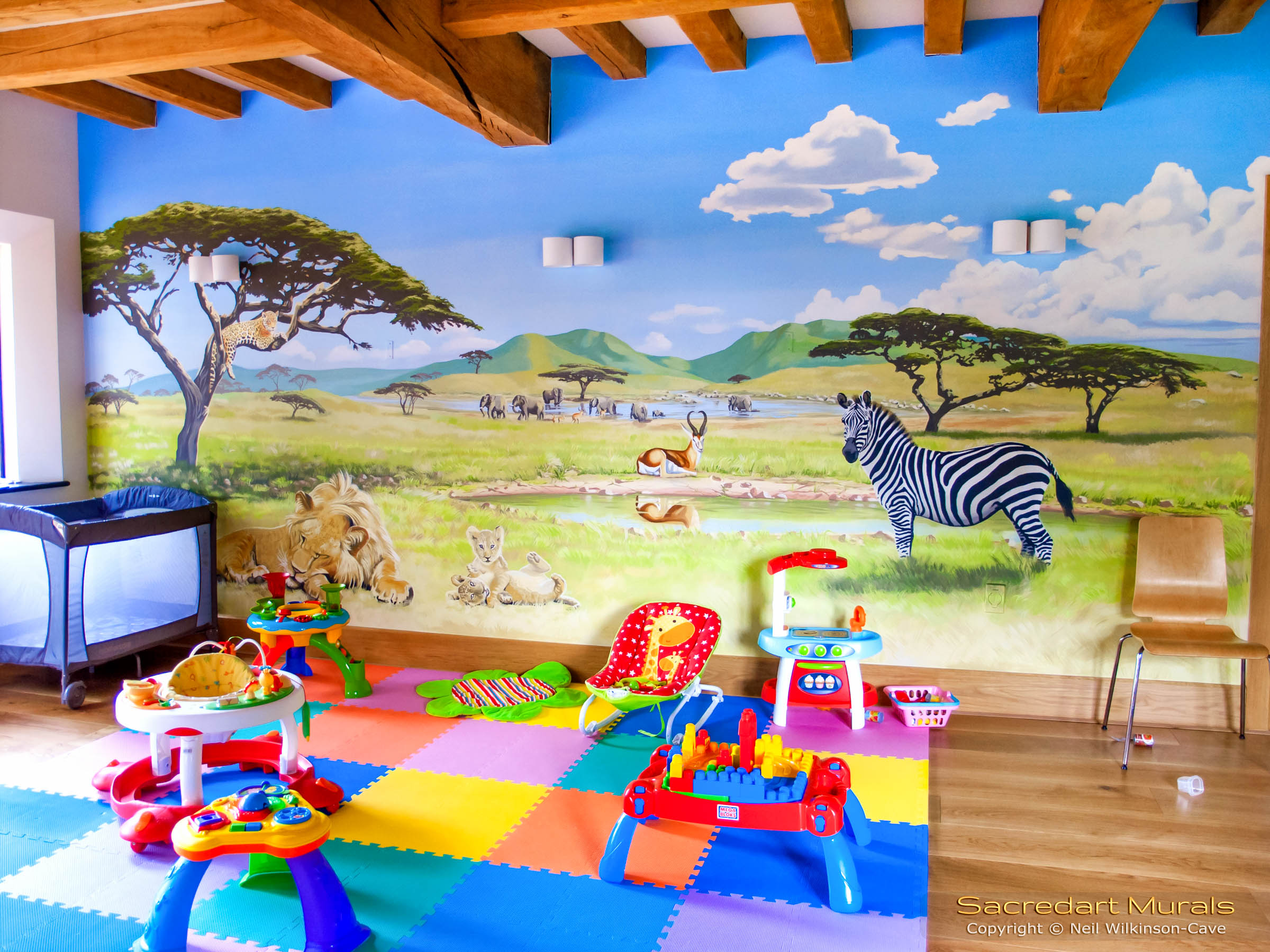 playroom safari mural with toys